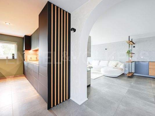 Blick in Küche und Wohnbereich Wohnung 2