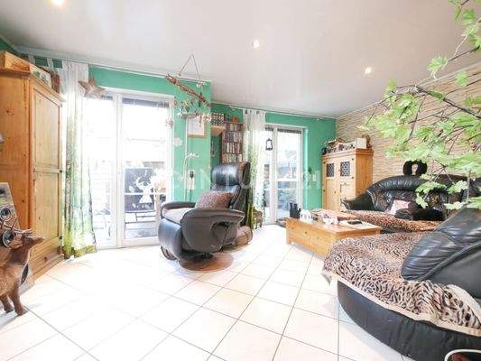 Offener Wohn-/ Essbereich mit Ofen