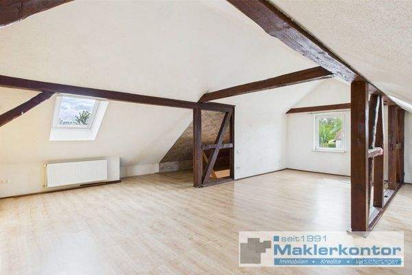 Dachgeschoss/Wohnbereich mit Kamin