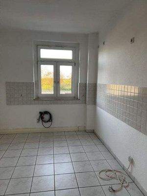 Küche mit Fliesenspiegel