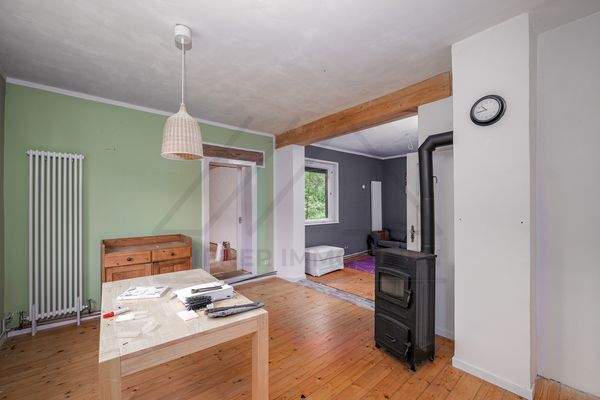 Esszimmer mit Blick zum Wohn- und Gästezimmer