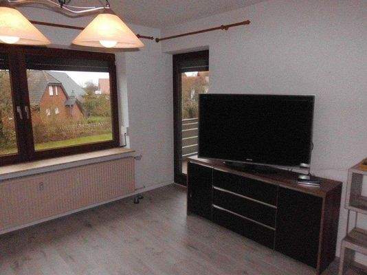 Wohnbereich mit Zugang zu Loggia