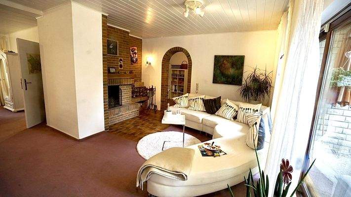 Wohnzimmer mit Kamin