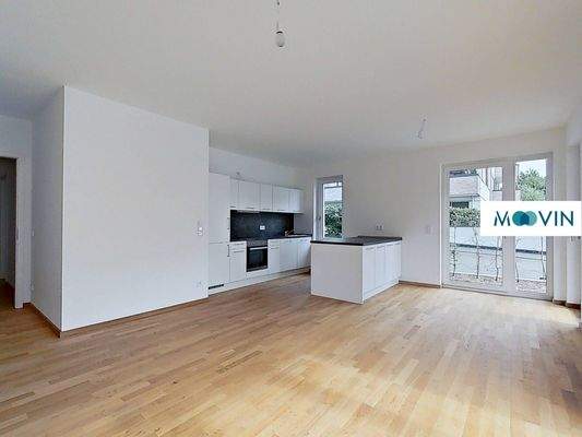 Ansicht II: Wohn- und Esszimmer mit offener Küche