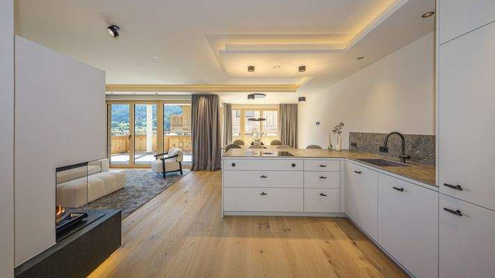 KITZIMMO-Exklusive Neubauwohnung mit traumhaftem Ausblick - Immobilien Brixen.
