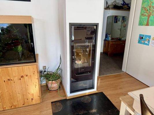 Wohnhaus OG: Detailaufnahme Holzofen