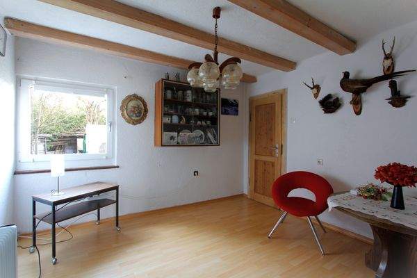 ...das Wohnzimmer mit Zugang...