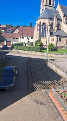 Gemüsegarten und Parkplatz