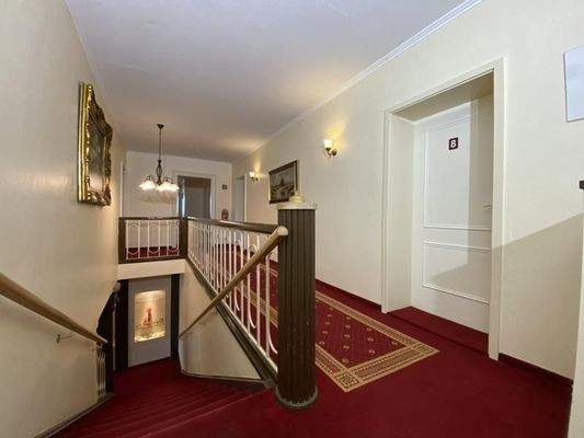 zu den Zimmern im Obergeschoss