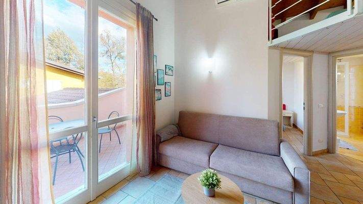 AM-056-Bilocale-in-residence-con-piscina-Living-Ro