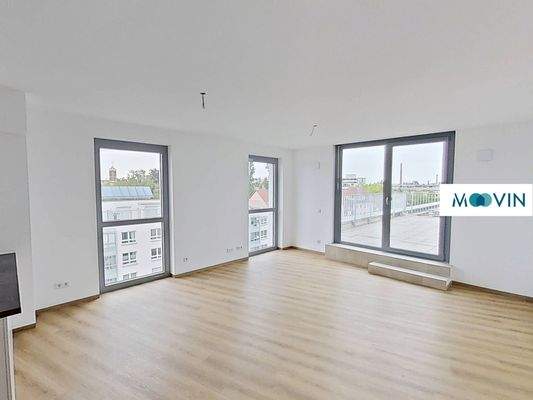 Ansicht II: Wohn- und Esszimmer mit offenem Küchenbereich