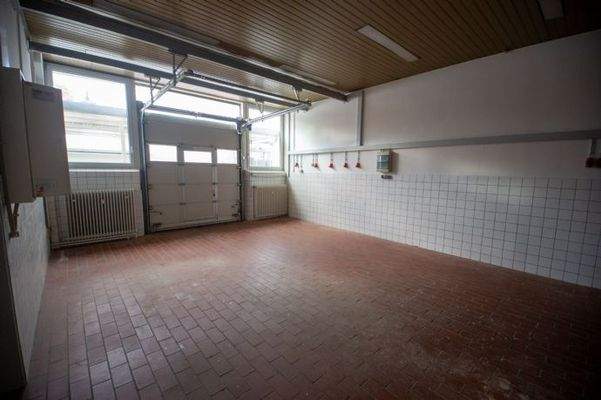 Elektrisches Segmenttor mit Schlupftüre 