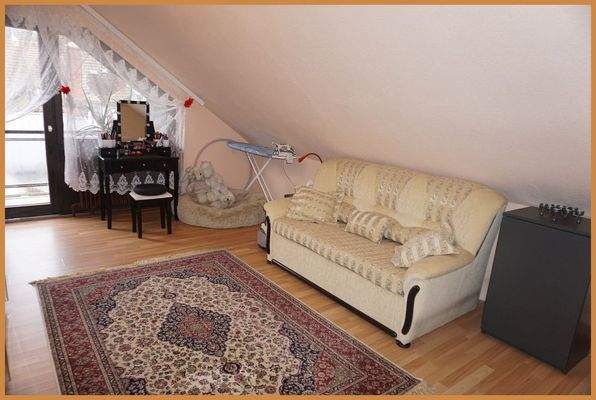 Dachgeschosswohnung Wohnzimmer