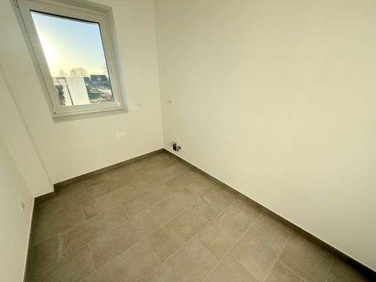 Abstellraum mit Wasseranschluss