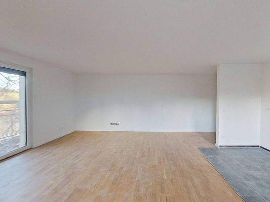 Ansicht II: Wohn- und Esszimmer mit offenem Küchenbereich