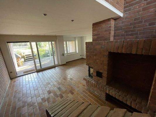 Wohnzimmer mit Kamin