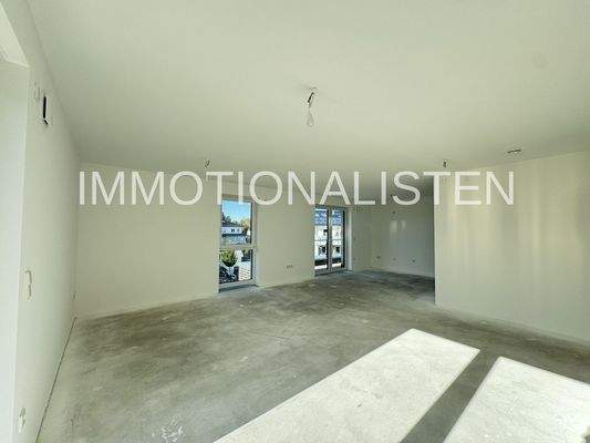 Wohnzimmer mit Blick zum Küchenbereich