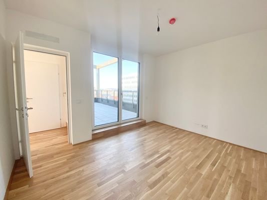 Schlafzimmer mit Zugang auf Terrasse 