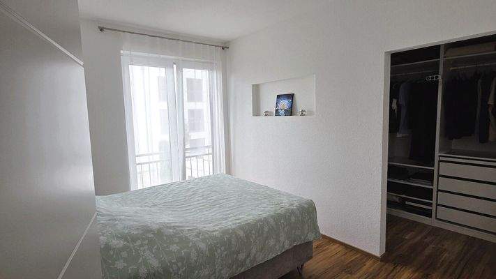 Schlafzimmer mit Ankleidezimmer