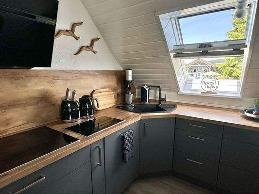 Ansprechender Kochbereich (DG) mit …