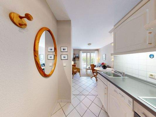 Blick in den Küchen-, Ess- und Wohnbereich