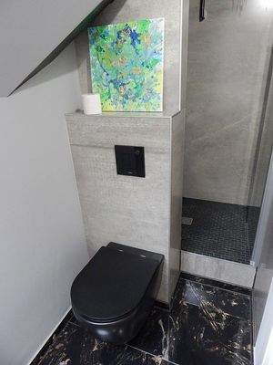 Gästedusche & Bidet-WC