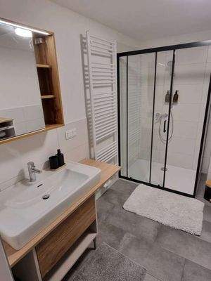 Spacious Bathroom with washing machine