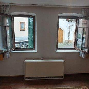 Nachtspeicher im Wohnzimmer