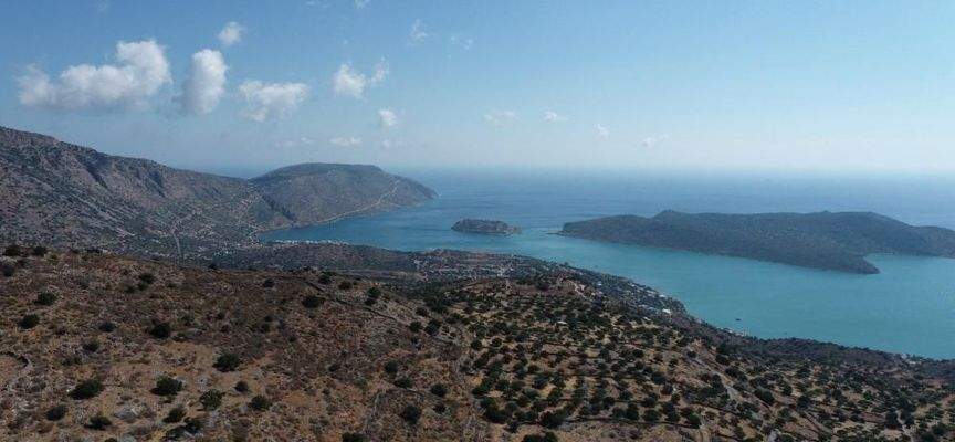 Kreta, Schisma Eloundas: Exklusives Grundstück mit Meerblick und Baugenehmigung zu verkaufen