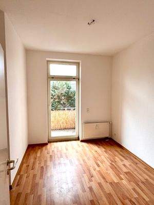 Zimmer mit Balkonzugang