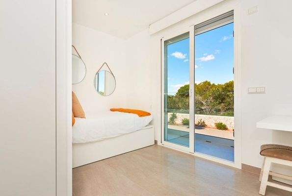 Schlafzimmer mit direktem Zugang zur Terrasse