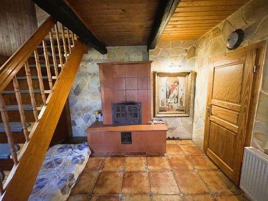 Eingangsbereich mit Ofen
