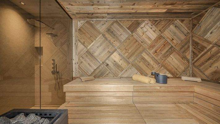 KITZIMMO-Luxuriöse Gartenwohnung mit eigenem Wellnessbereich - Immobilien Brixen.