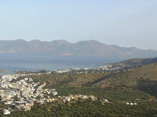 Kreta, Elounda: Baugrundstück mit Meerblick im Elite-Touristengebiet zu verkaufen