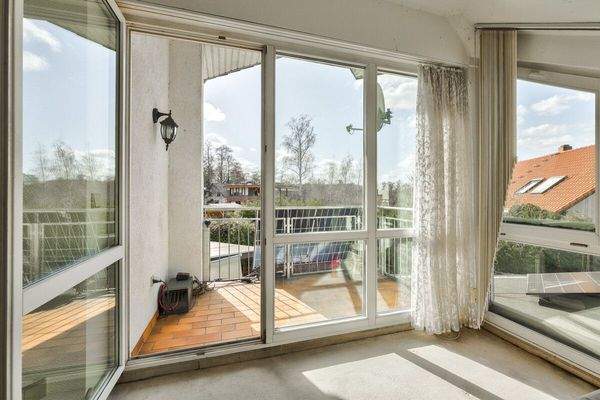 Schlafzimmer mit Balkonzugang