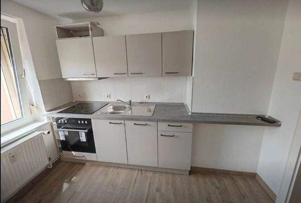 Wohnküche mit Einbauküche