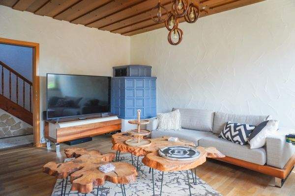 Wohnzimmer EG + Kachelofen