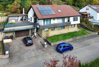 Ansicht Süd/West mit Garage und Wintergarten