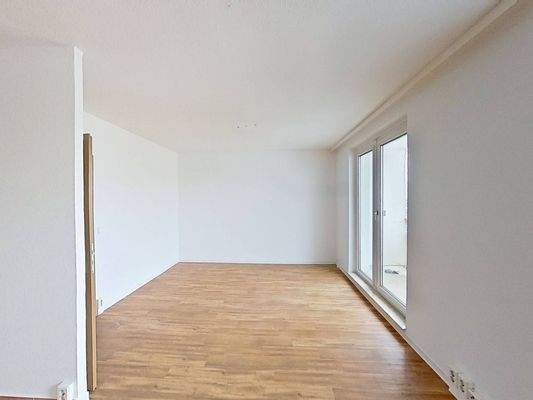 Ansicht III: Wohn- und Esszimmer mit offenem Küchenbereich