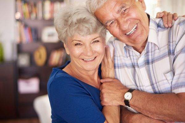 portrait-of-happy-senior-couple-in-arms.jpg