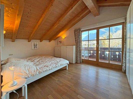 Schlafzimmer mit Balkonzugang