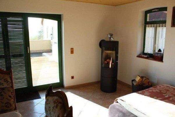 Kaminzimmer mit Ausgang zur 40 m² Dachterrasse