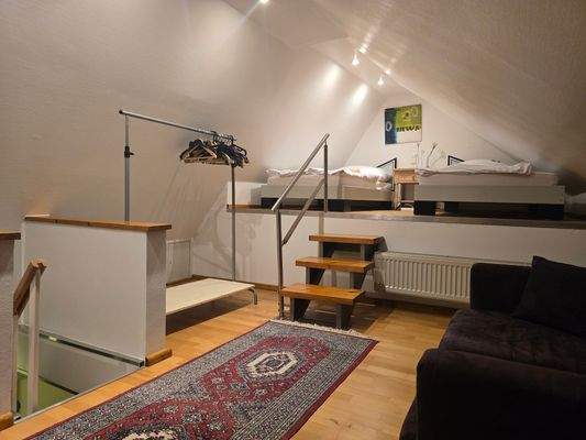 ausgebauter Spizboden mit Schlafkoje und Wohnbereich