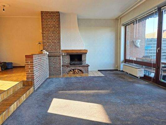 Wohnzimmer mit Kamin