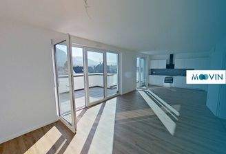 Ansicht I: Wohn- und Esszimmer mit offenem Küchenbereich