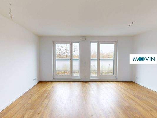 Ansicht II: Wohn- und Esszimmer mit offenem Küchenbereich