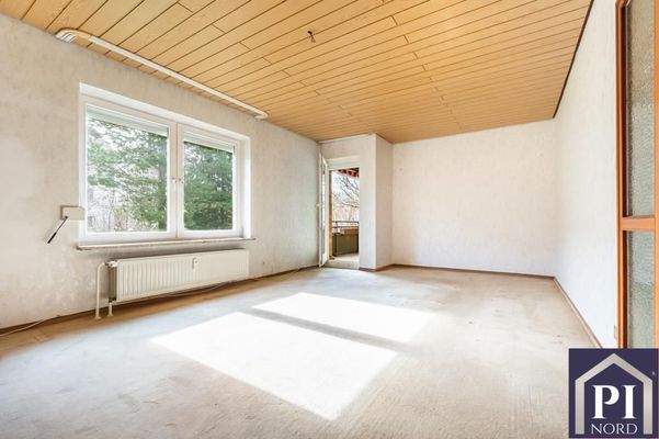 Wohnzimmer in Südausrichtung mit Balkon
