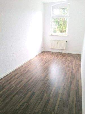Schlafzimmer mit Laminat