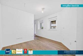 Offener Wohnraum mit Küchenanschluss 