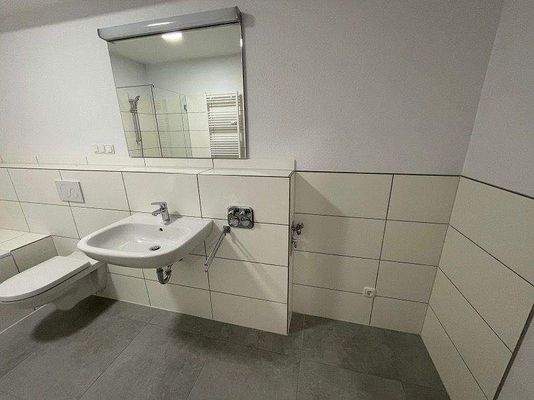 Badezimmer mit Waschmaschinenanschluss